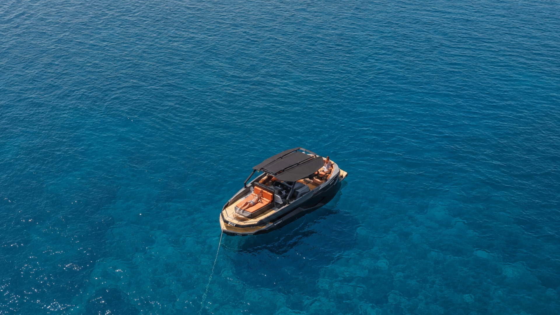 Aerial view of the KAY yacht cruising across the Mediterranean