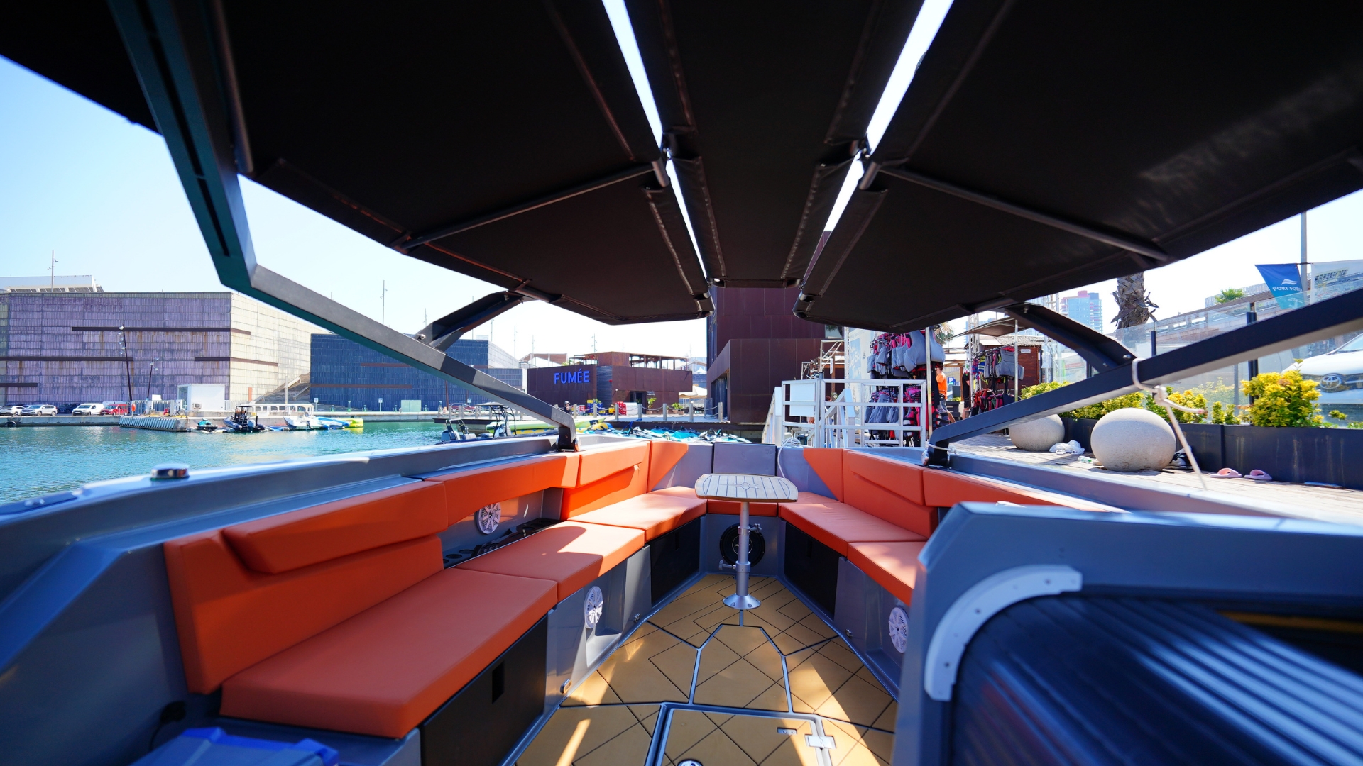 Outdoor lounge with sofas and table aboard the KAY sport yacht