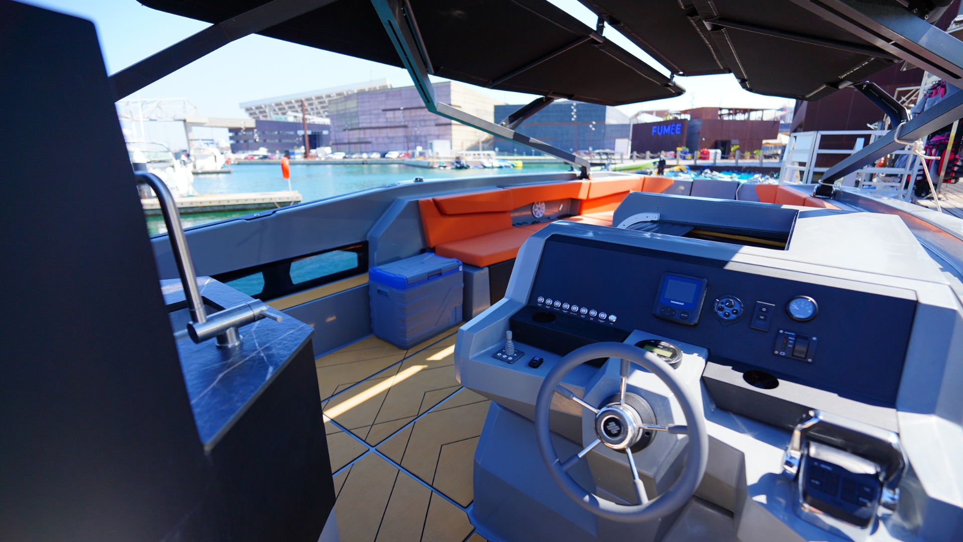 Helm station and lounge area aboard the private KAY sport yacht